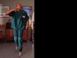 Black Man In Scrubs Dancing